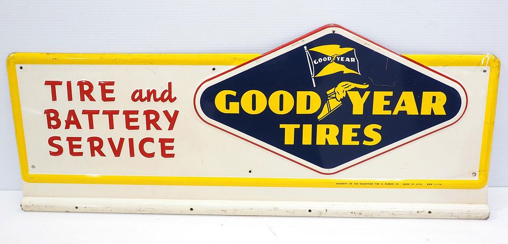 Lot 1141: Goodyear Tires display rack sign