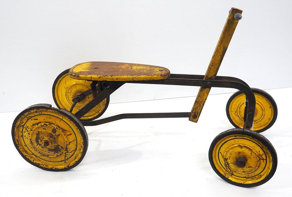 Lot 1167: Child's 4-wheel push & go toy