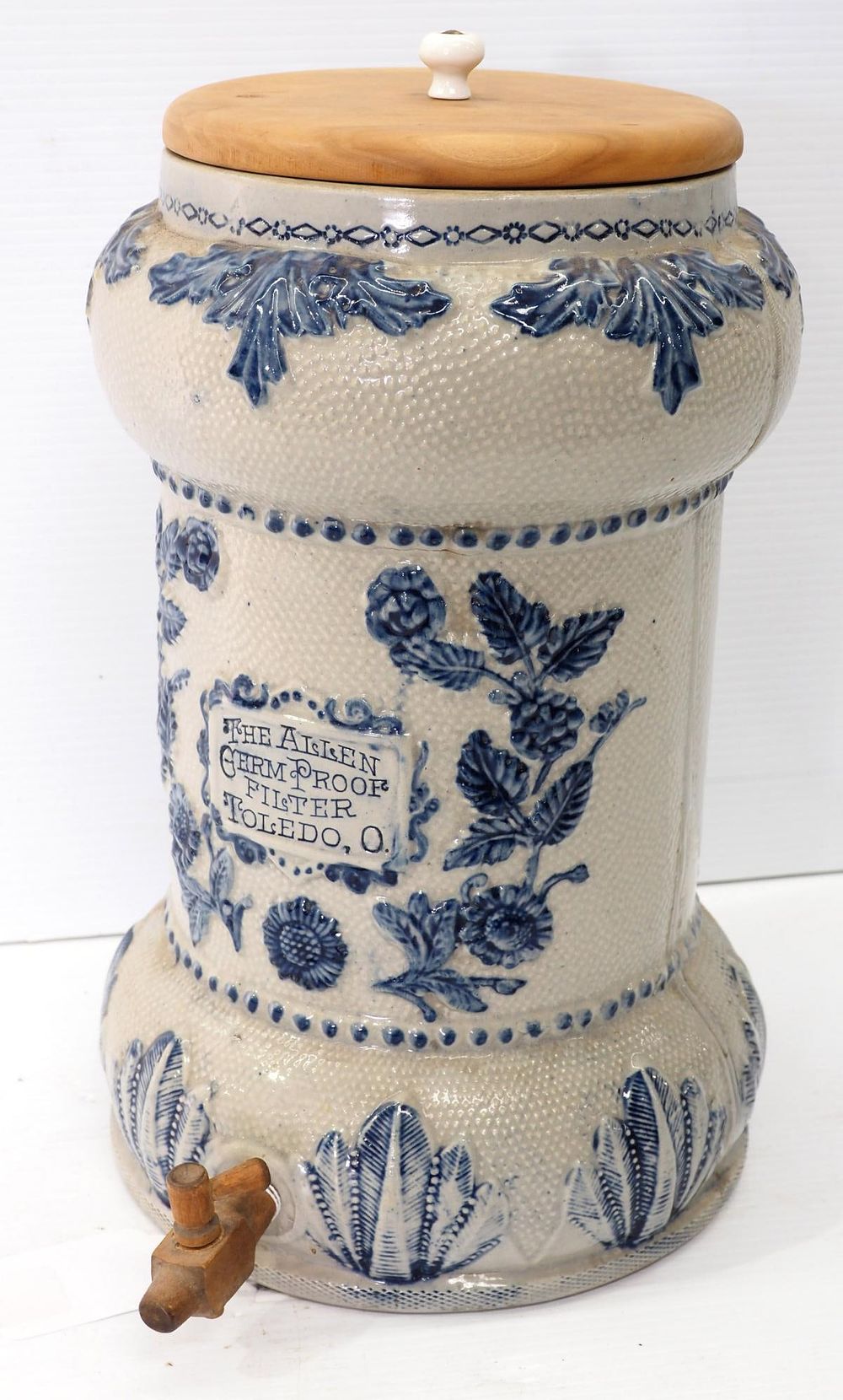 Lot 1185: Crock dispenser with newer wooden lid,