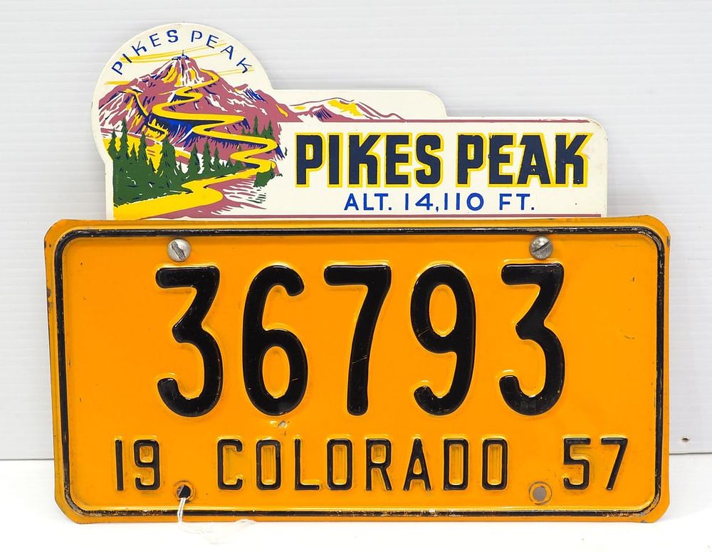 Lot 1187: Pikes Peak license plate topper with license plate