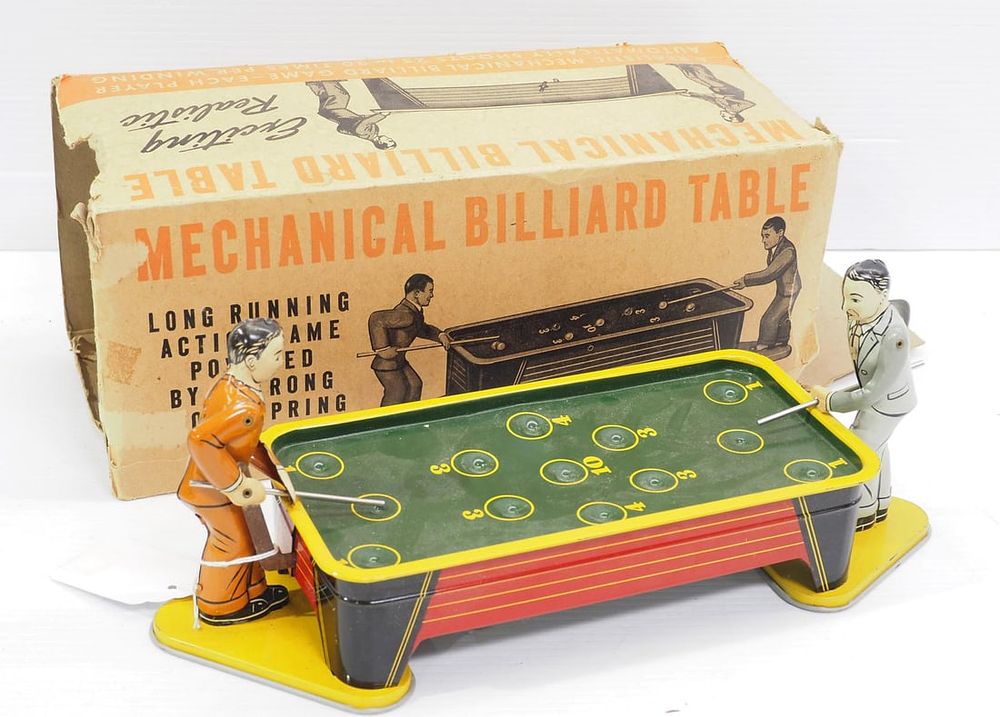 Lot 1198: Tin wind-up toy with box