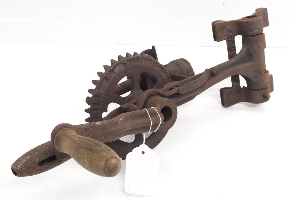 Lot 1208: Sterling hand-crank fence maker