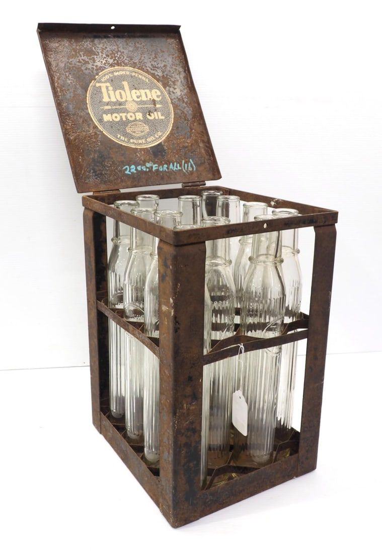 Lot 1215: Tiolene oil bottles with metal case