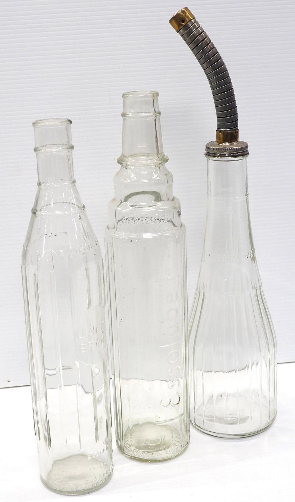 Lot 1225: (3) Glass 1-quart oil bottles