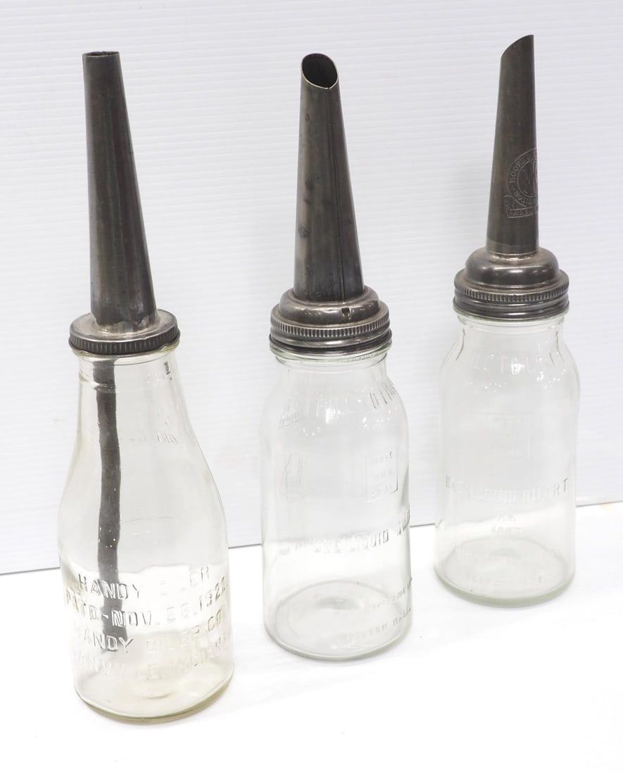 Lot 1228: (3) 1-quart glass oil bottles with spouts