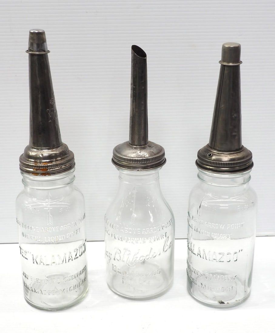Lot 1231: (3) 1-quart glass oil bottles with spouts