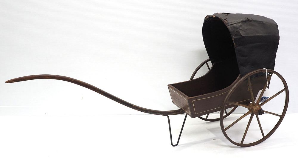 Lot 1245: Child toy wooden pull-carriage