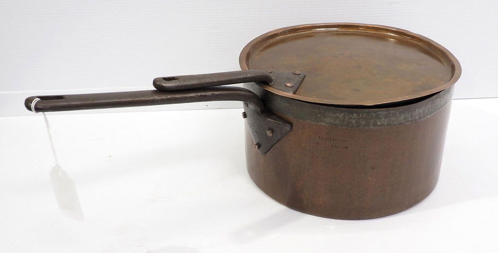 Lot 1259: T. Grieve & Co. brass pot with lid