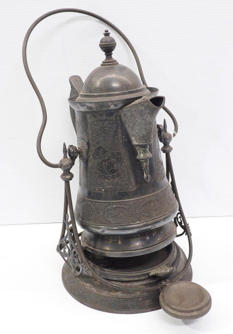 Lot 1260: Brass railroad coffee/tea butler