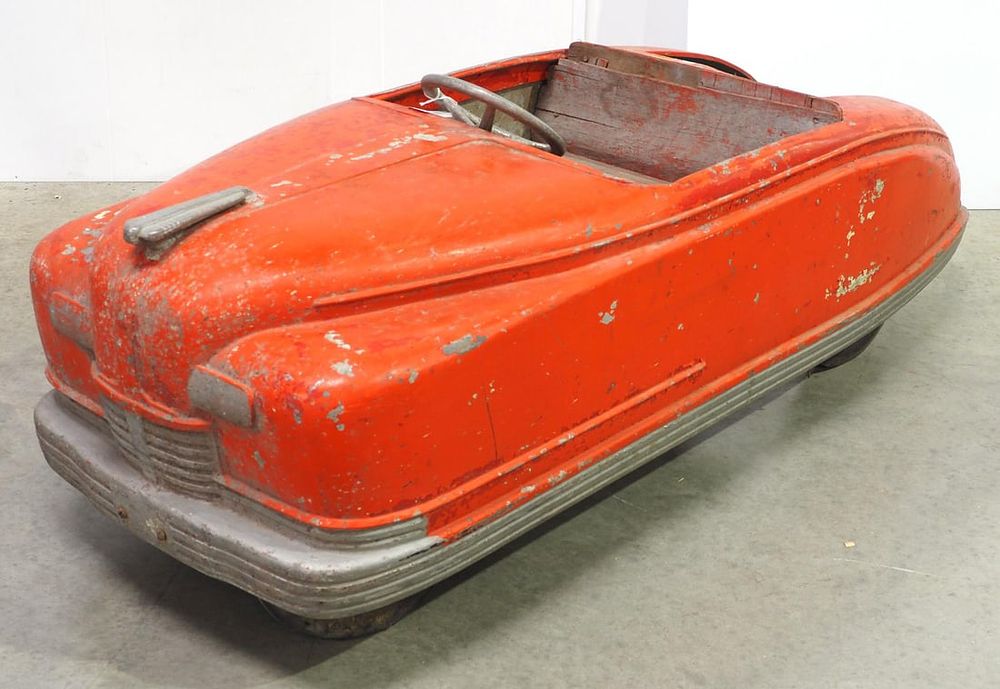Lot 1295: Cast aluminum car from amusement park ride
