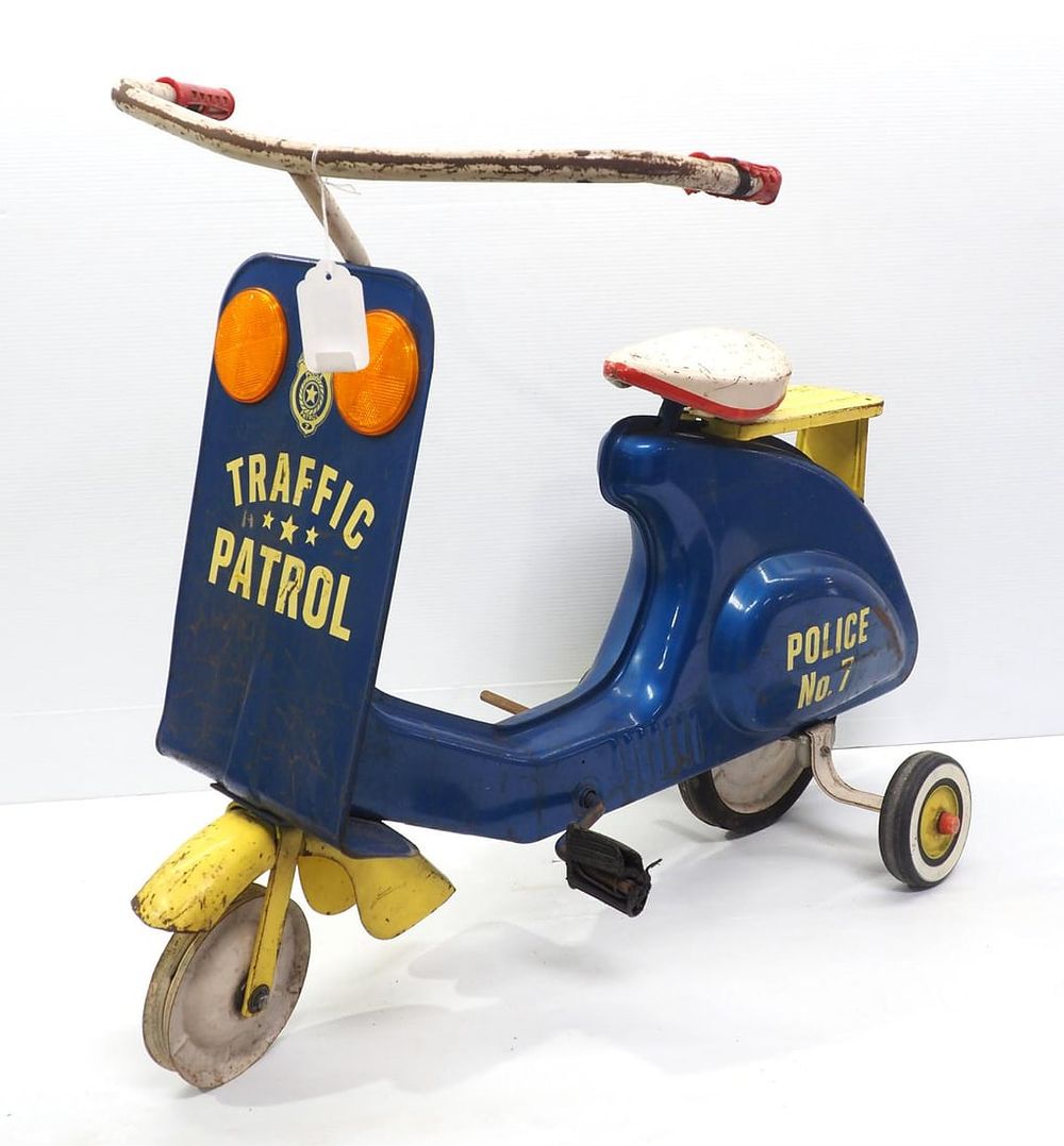 Lot 1297: Child's pedal scooter