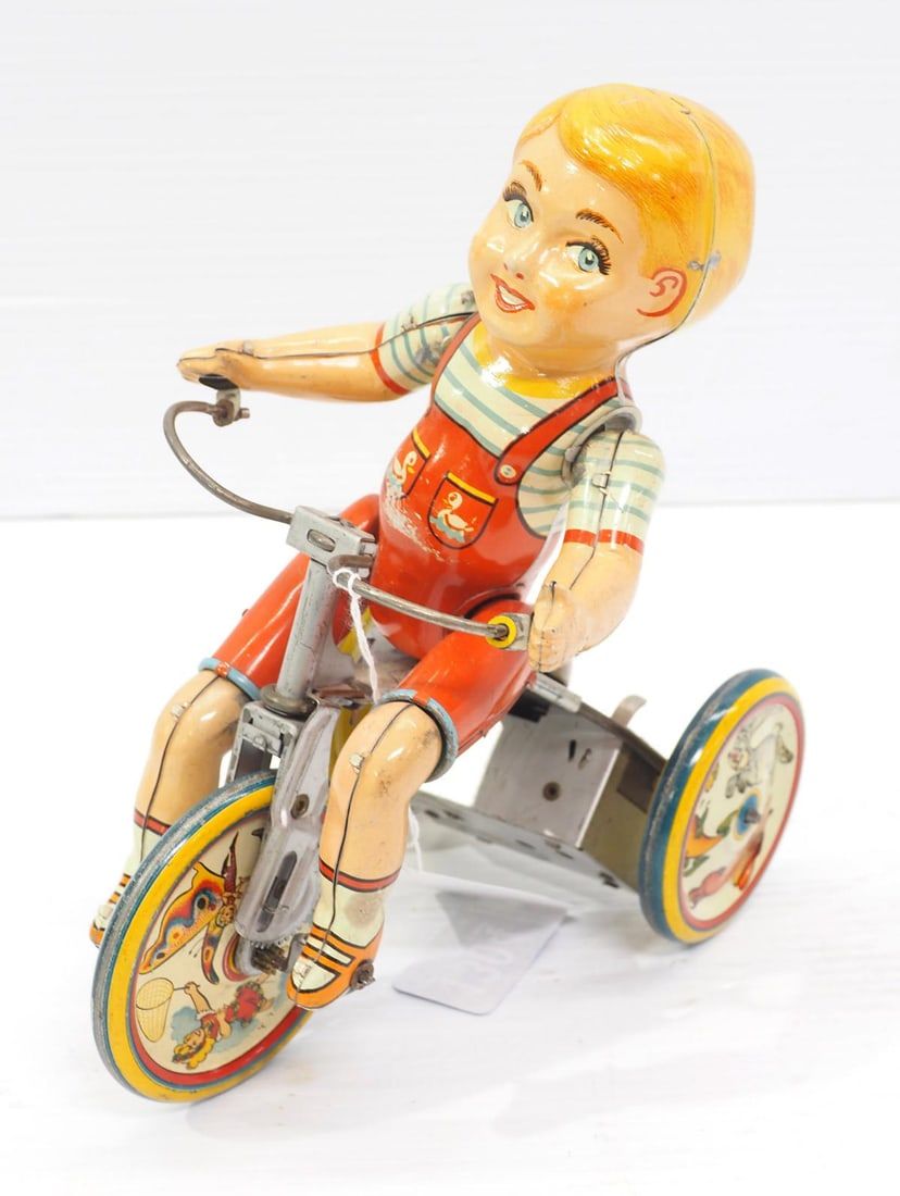 Lot 1304: Kiddy Cyclist tin wind-up toy