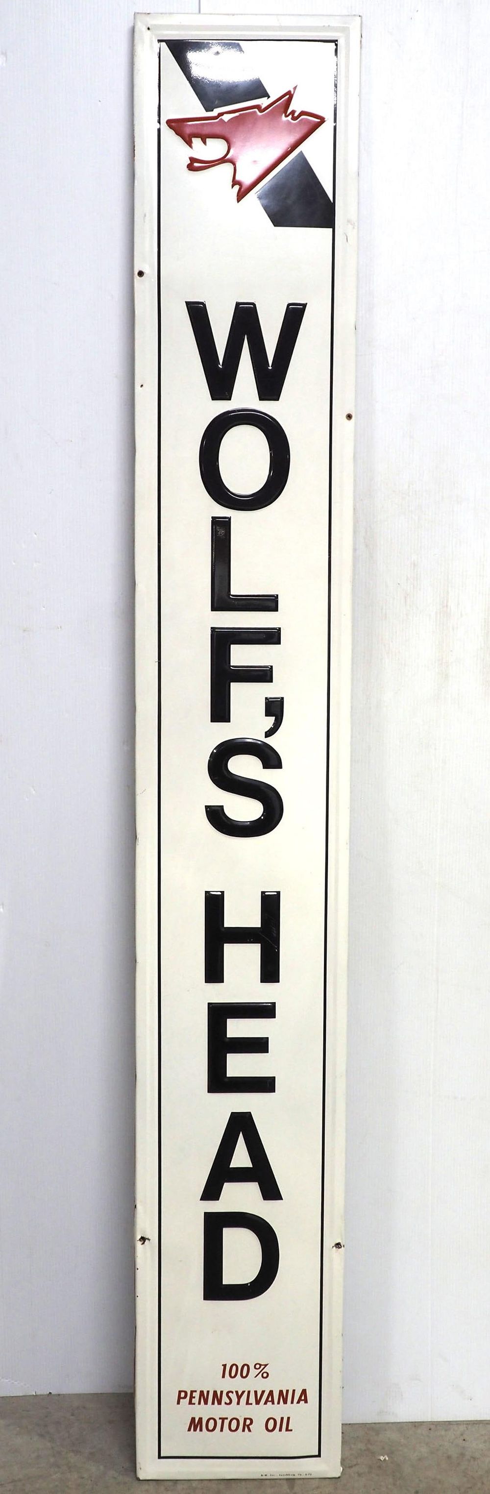 Lot 1311: Wolf's Head sign with wood back frame