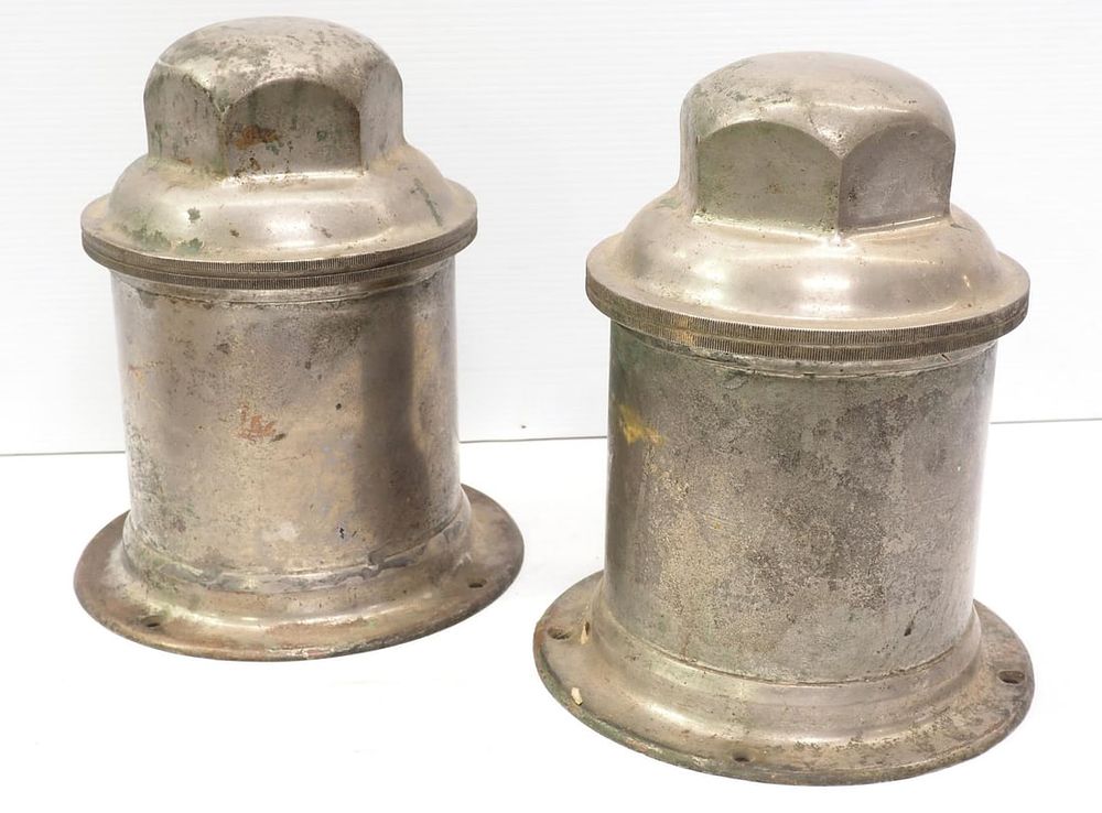 Lot 1365: (2) Solid brass store display lugs