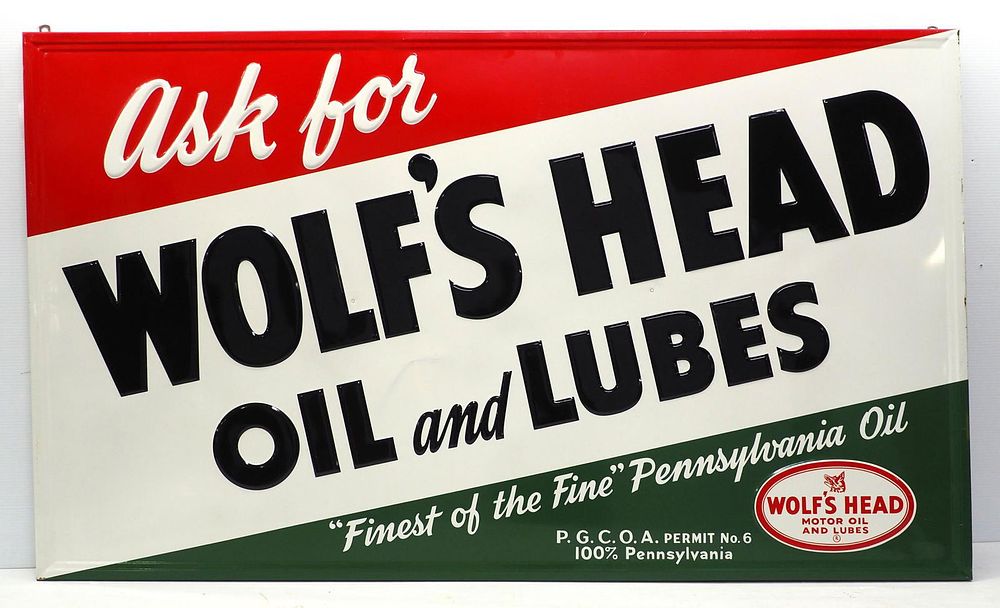 Lot 1368: Wolf's Head Oil and Lubes self-framed sign