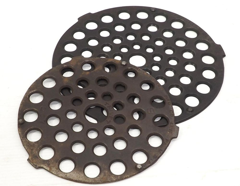 Lot 22: (2) Cast iron Griswold trivets