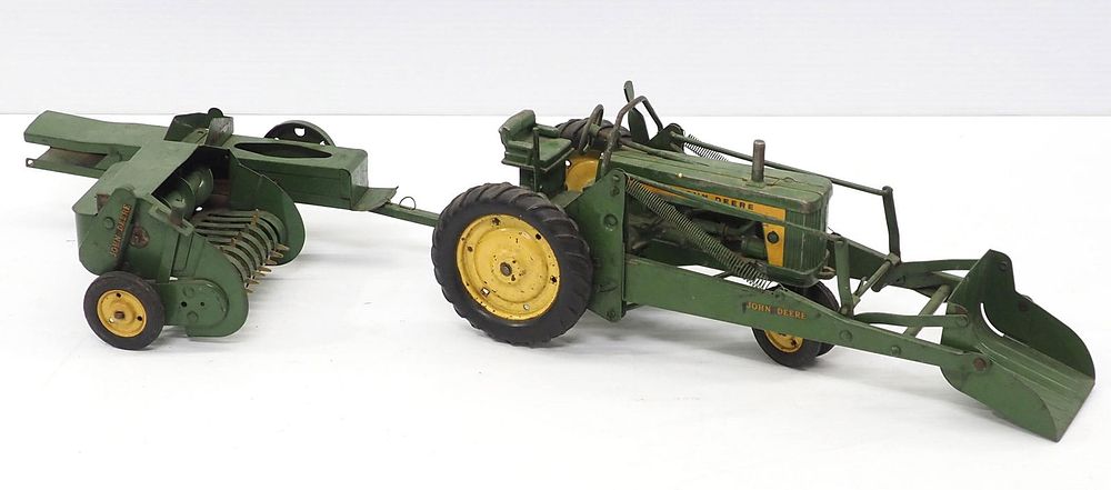 Lot 68: John Deere toy tractor / John Deere toy baler