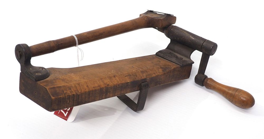 Lot 167: Early wooden apple peeler