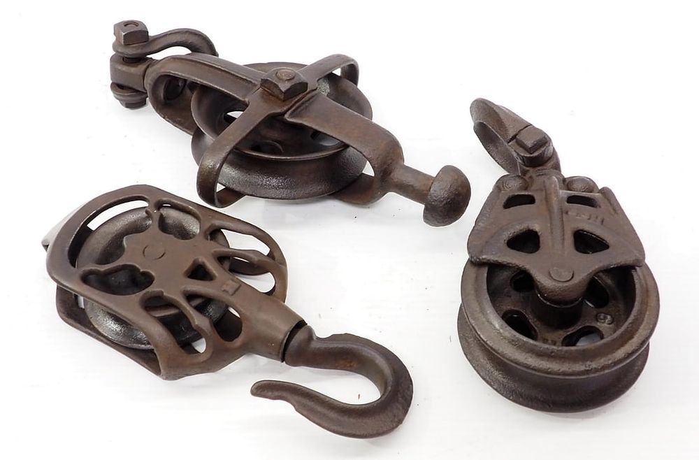 Lot 409: (3) Hay carrier pulleys