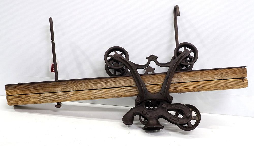 Lot 415: V.L. Ney wood beam hay carrier