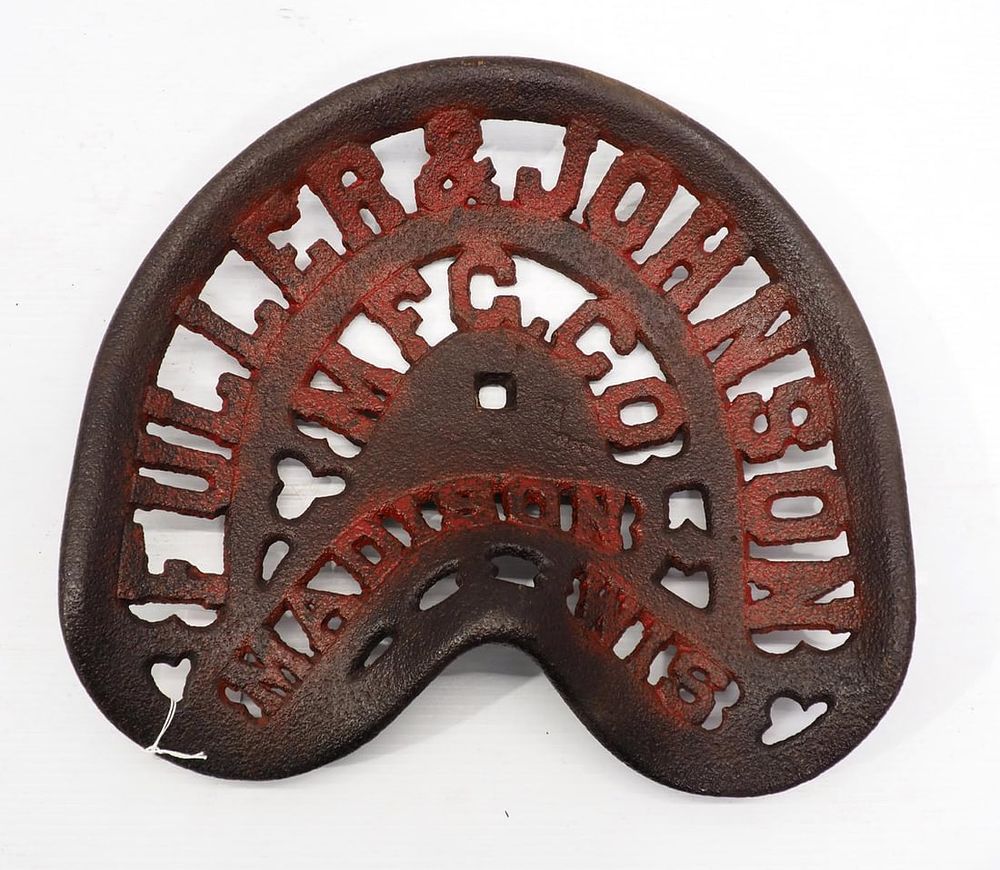 Lot 680: Fuller & Johnson cast iron seat