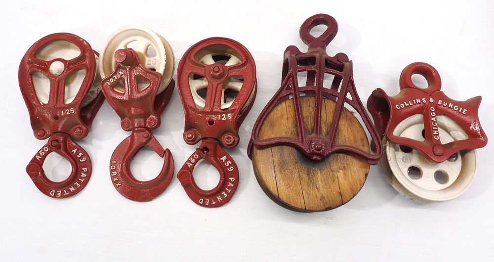 Lot 838: (5) Hay pulleys