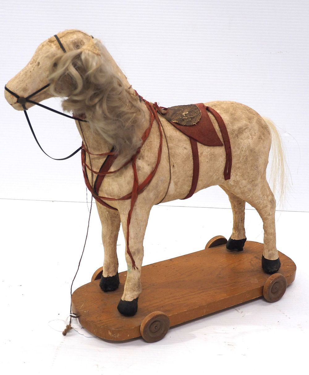 Lot 1205: Child's horse pull toy