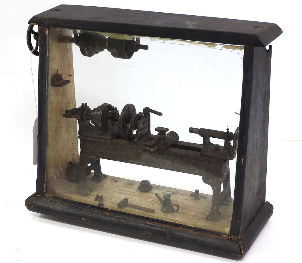 Lot 1228: Cast iron miniature shop lathe with tools