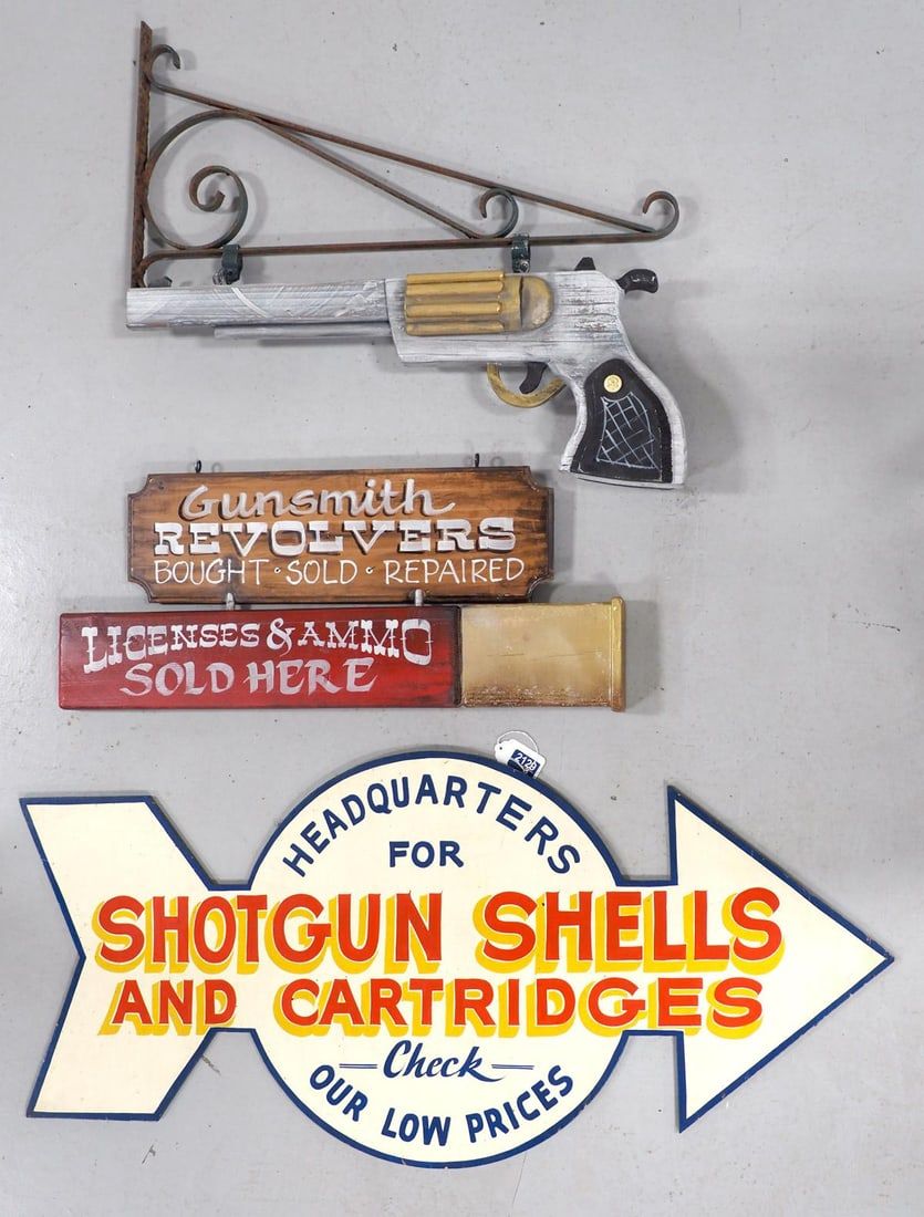 Lot 2129: Wooden shotgun shells and gunsmith sign