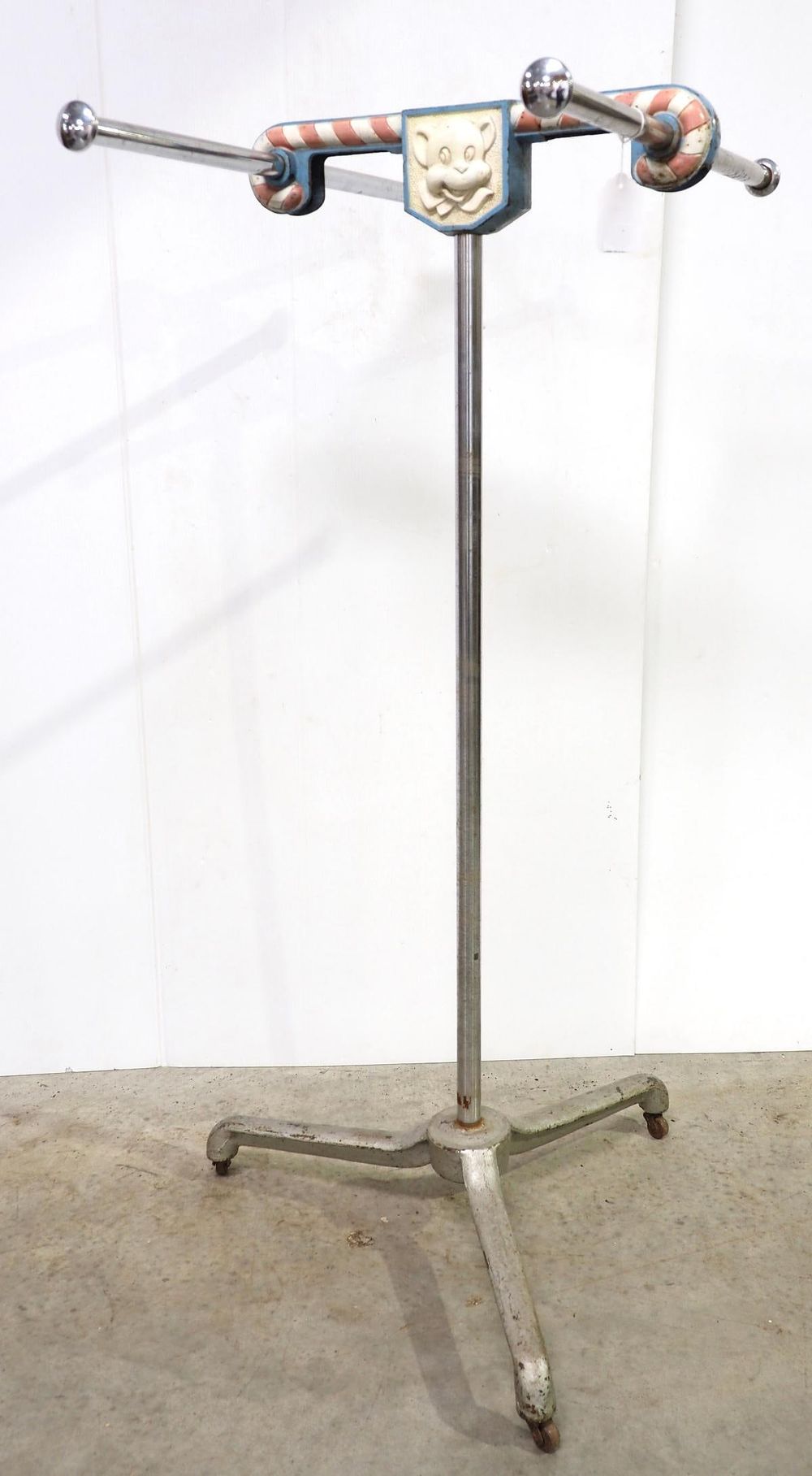 Lot 2255: Store clothing rack with cast iron base and top