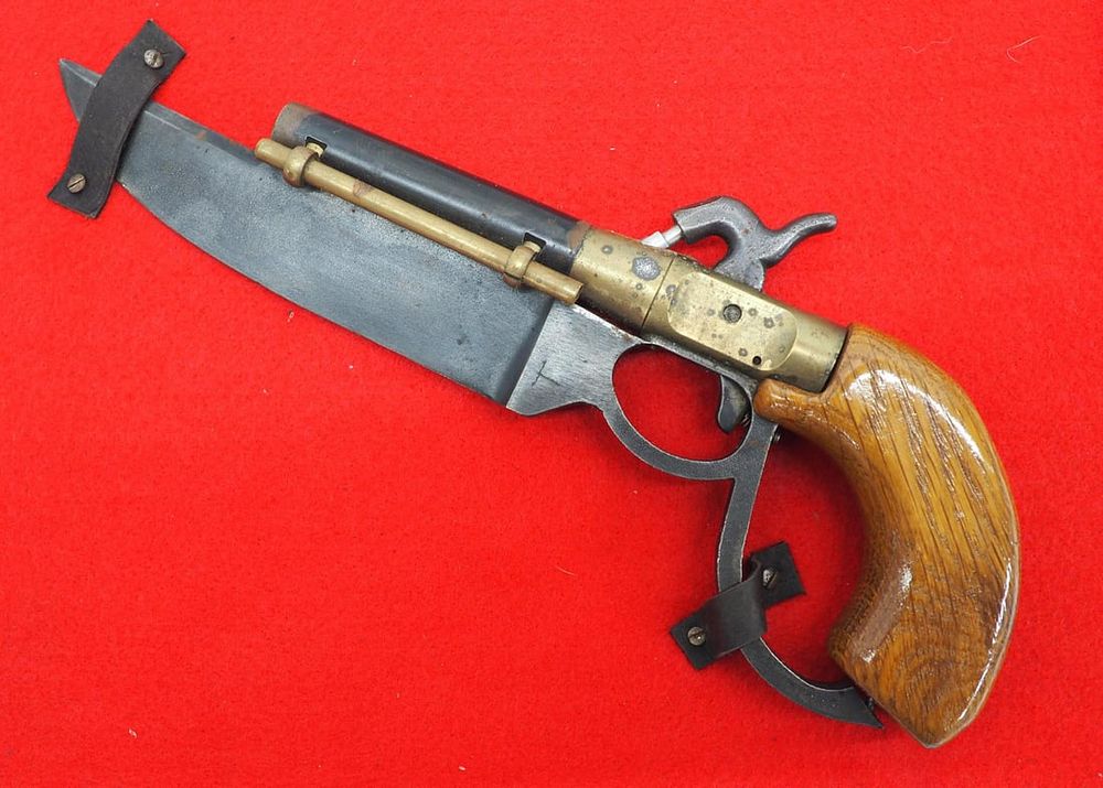 Lot 608: Combination gun/knife? You name it!