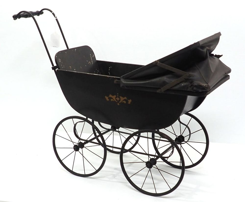Lot 37: Early wooden doll buggy