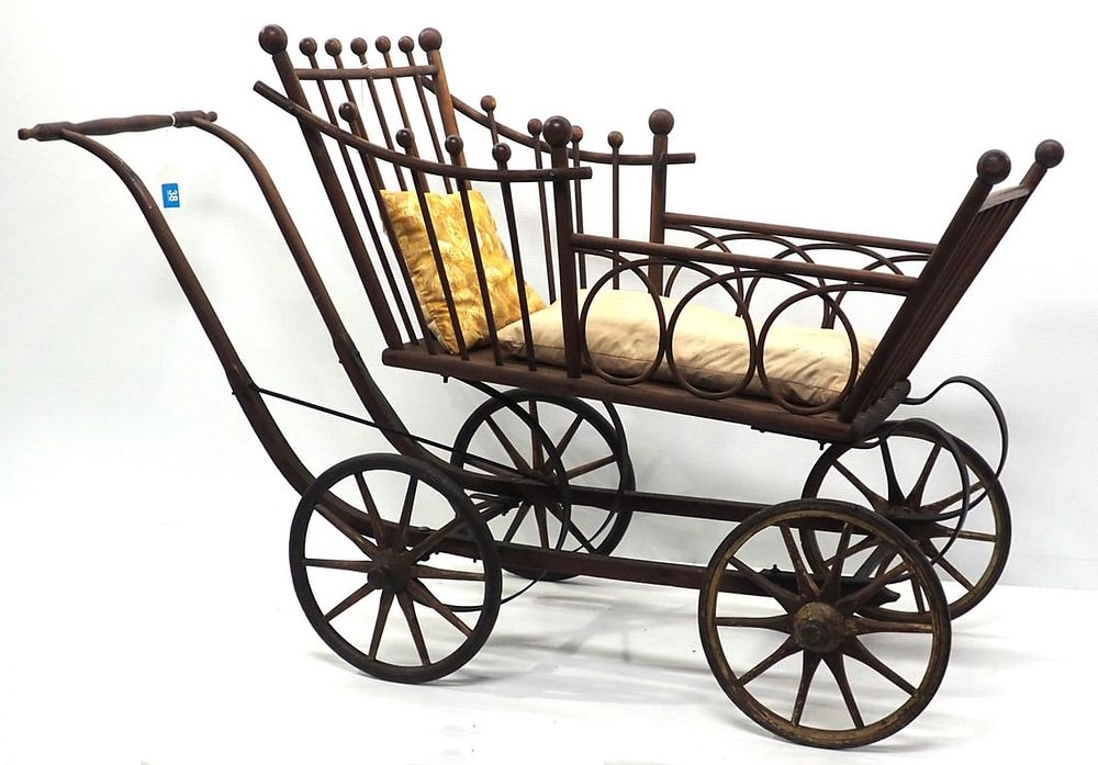 Lot 38: Early wooden baby buggy