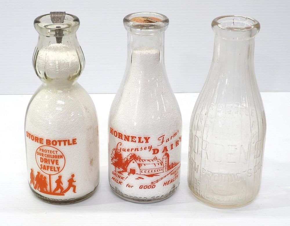 Lot 101: (3) 1-quart, glass milk bottles