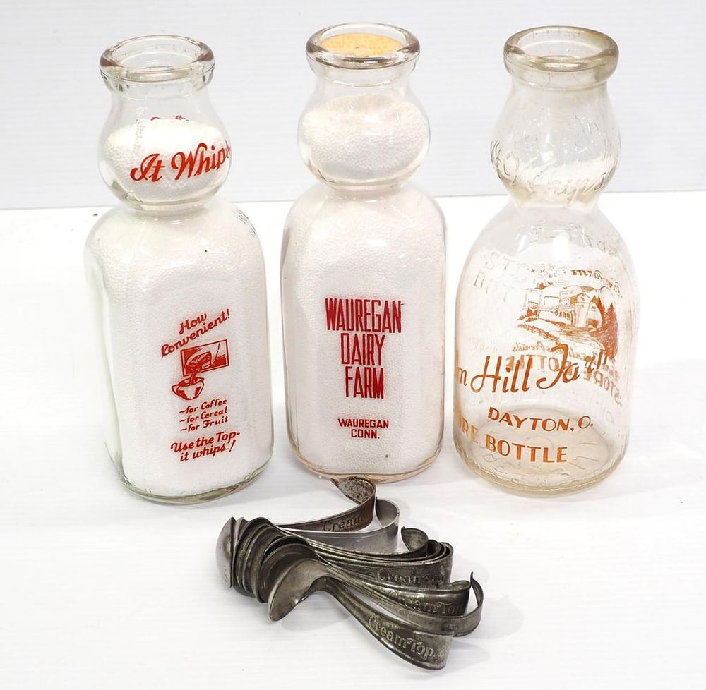 Lot 102: (3) Cream top milk bottles & (9) spoons