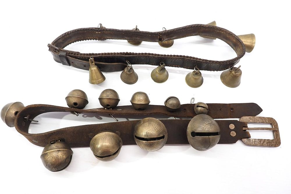 Lot 115: (2) Short leather straps with brass bells
