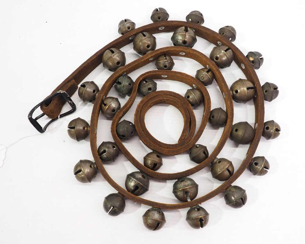 Lot 116: Leather strap with (35) harness bells