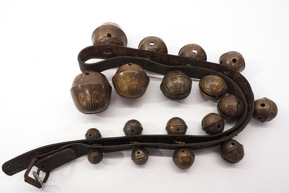 Lot 117: Leather strap with (18) harness bells