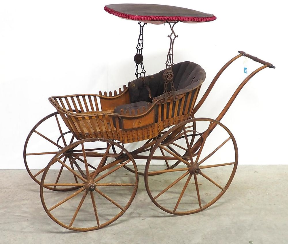 Lot 120: Early wooden buggy with top