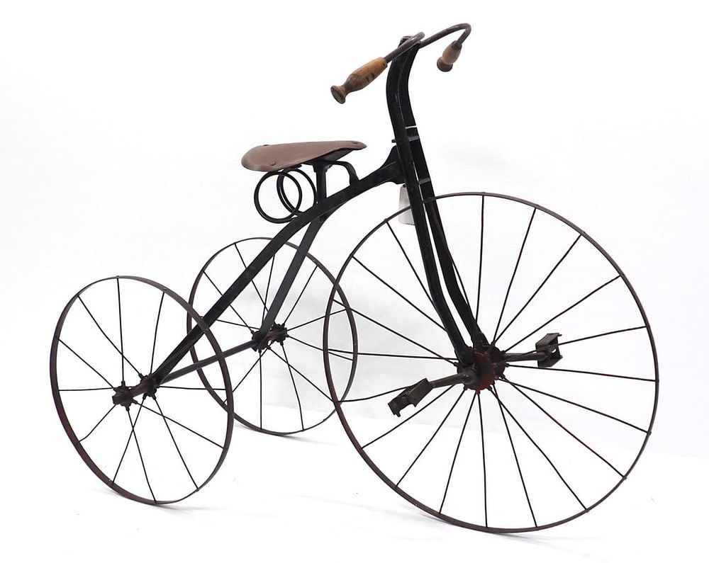 Lot 124: Early child's tricycle with leather seat