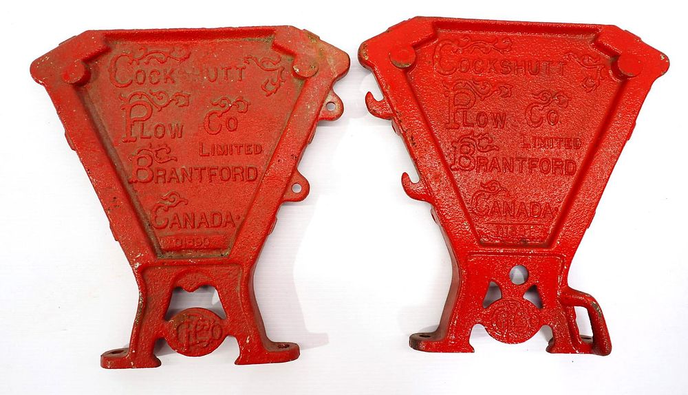 Lot 328: Pair of cast iron Cockshutt planter box ends