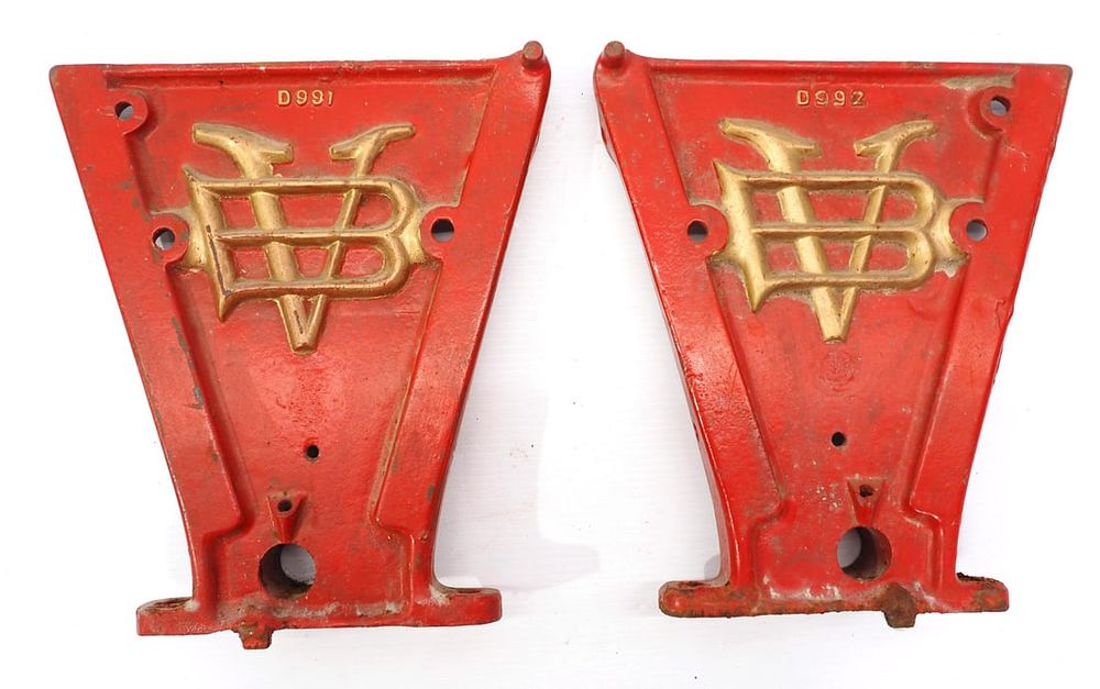 Lot 329: Pair of cast iron Van Brundt planter box ends