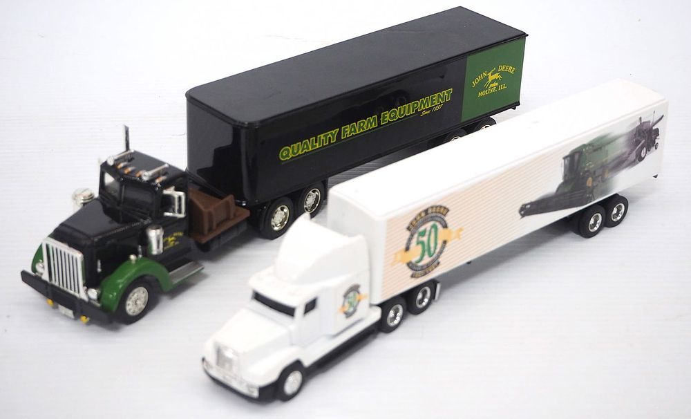 Lot 275: (2) Ertl John Deere Truck & Trailers
