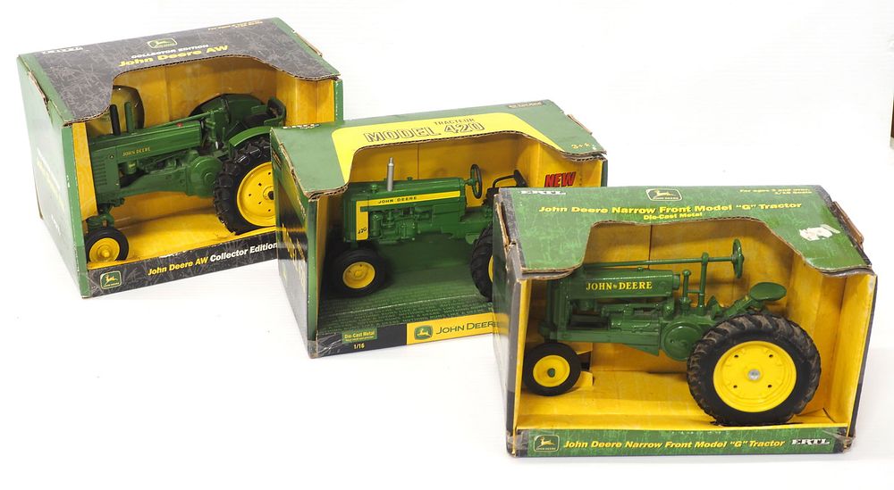 Lot 370: (3) Ertl John Deere Tractors