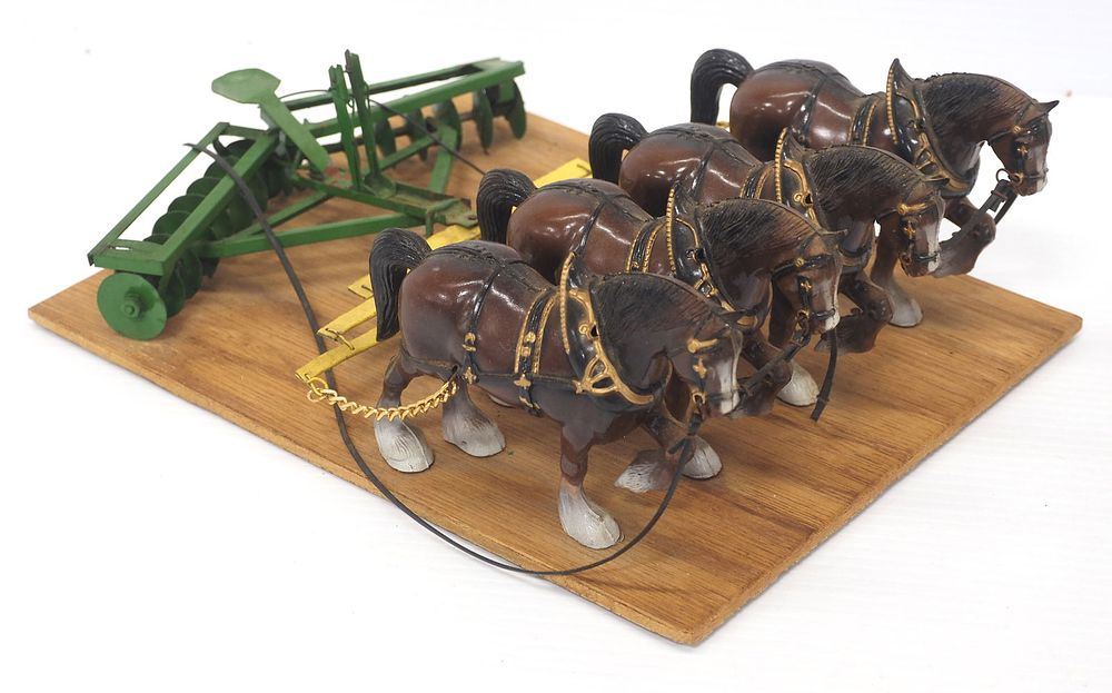Lot 399: 4 Horses hitched to a Disc