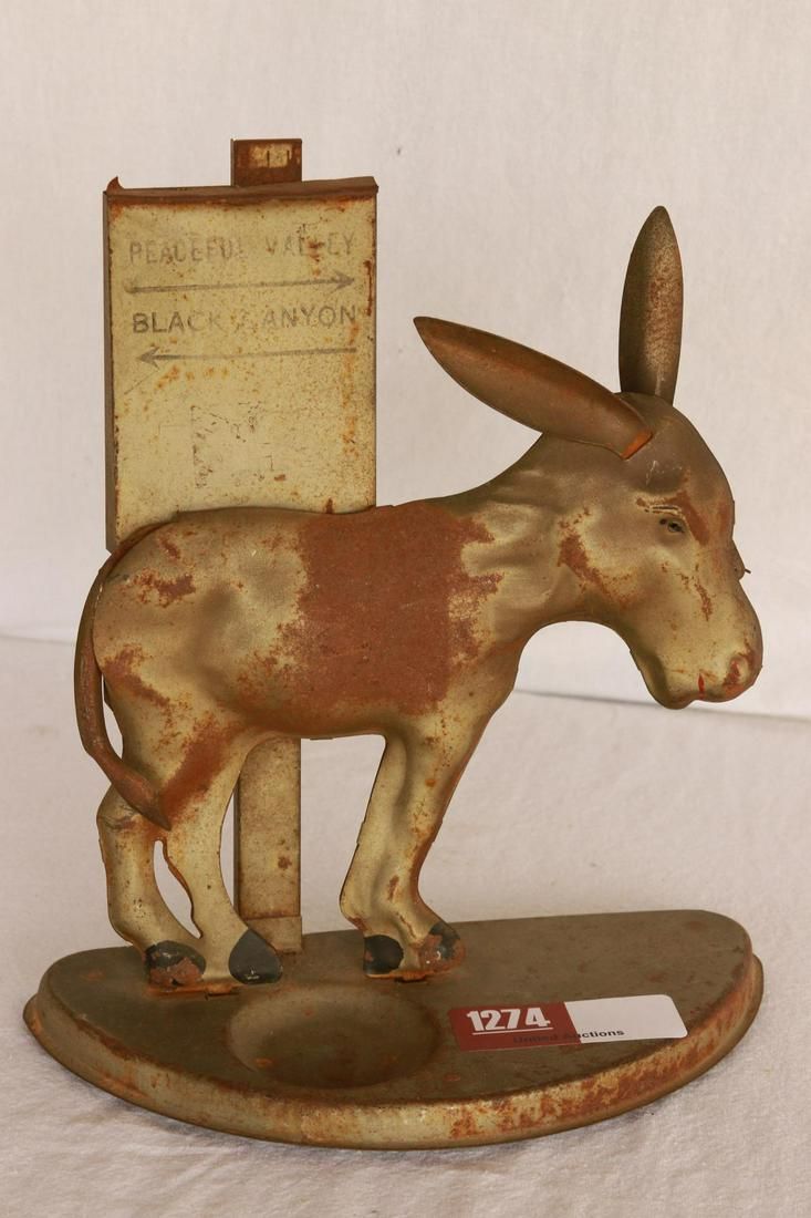 Lot 1274: Tin Donkey Cigarette Dispenser