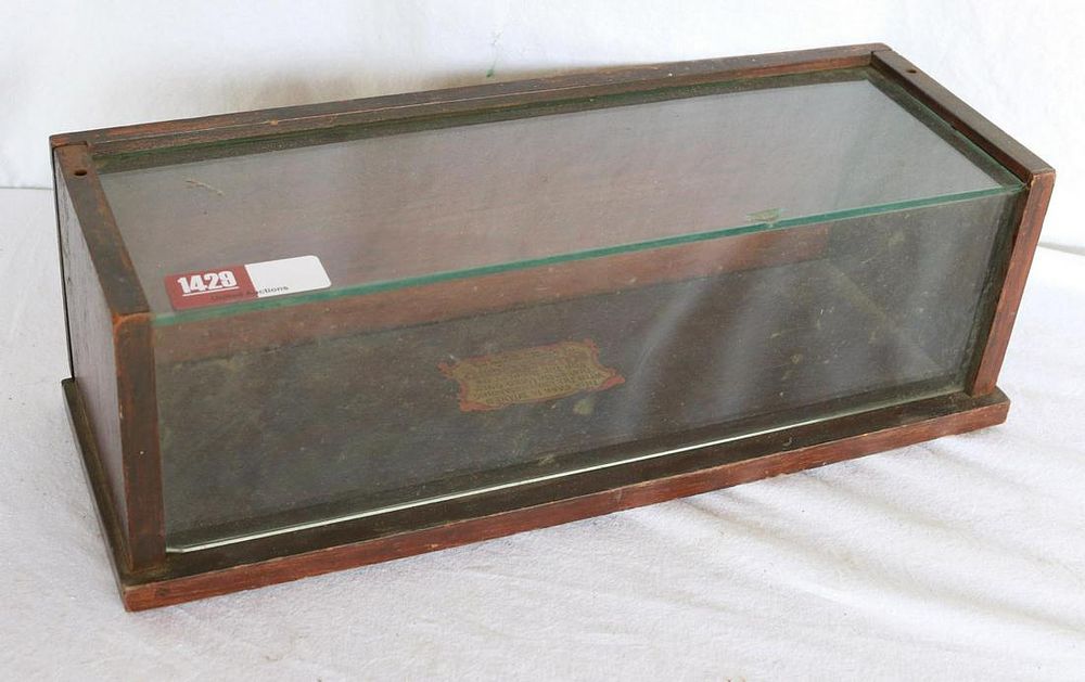 Lot 1429: Seal Packer Chief Table Top Display Case