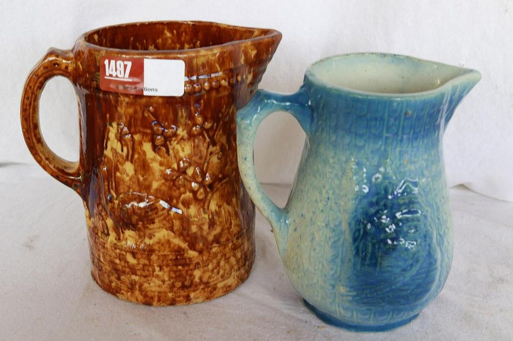 Lot 1497: (2) Stoneware Milk Pitchers