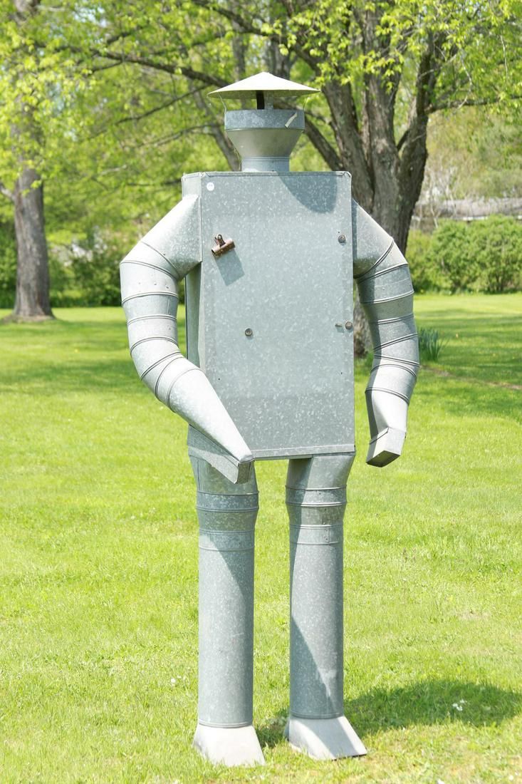 Lot 203: Stove Pipe Tin Man Store Display