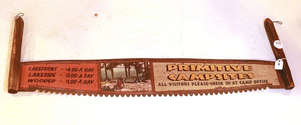 Lot 518: 2-Man Saw advertising Primitive Campsites